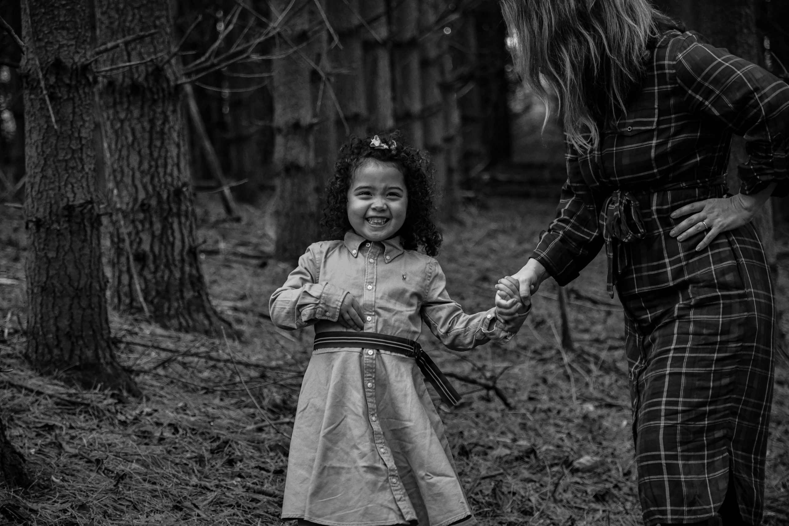 Girl smiling in woods